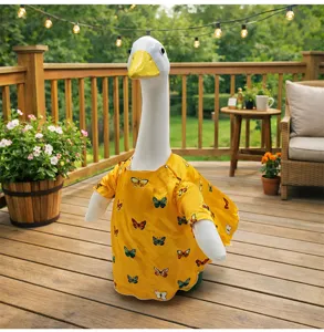 Detail view of a cute pet duck shirt with yellow butterfly print, perfect for summer outdoor wear.