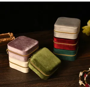 Premium colorful square velvet jewelry organizer boxes featuring gold zipper closures