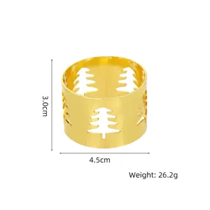 Vista detallada del servilletero de metal dorado con diseño de árbol de Navidad