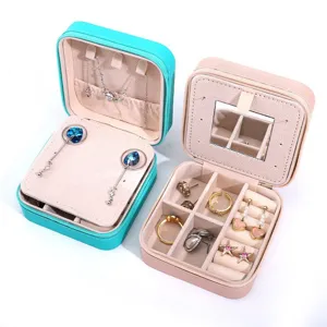 Portable jewelry storage box with mirror and zipper for rings and necklaces