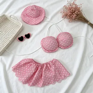 Pink polka dot bikini set with sun hat and sunglasses for 23-inch plush goose toy main.