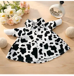 Cute black and white cow print garden goose outfit shirt apparel for seasonal lawn decor.
