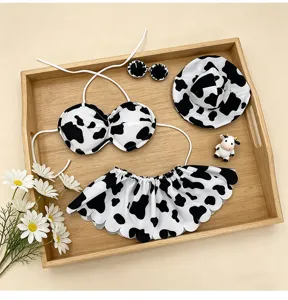 Cow print bikini set outfit for goose statue porch decor dress up accessories detail