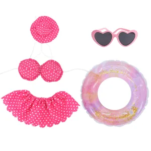 Cute pink polka dot bikini set with sunglasses and glitter swim ring for 23-inch goose.