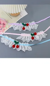 Cute lace pet collar with ribbon and cherry decor, sweet cat and dog scarf accessory.
