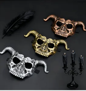 Halloween devil horn plastic mask detail view showing textured metallic finish in silver gold copper.