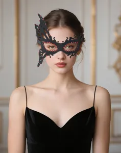 Close-up detail of black rhinestone bat masquerade mask, perfect for party and festival style.