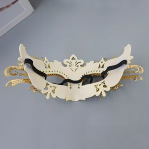 Elegant white and gold masquerade half-face mask with intricate feather design for party dress.