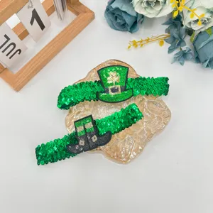 St. Patrick's Day green sequin headband with shamrock and top hat, perfect party hair accessory.