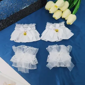 Polsini in pizzo lolita bianco con fiocchi carini e campanelli, accessori moda dolci e kawaii.