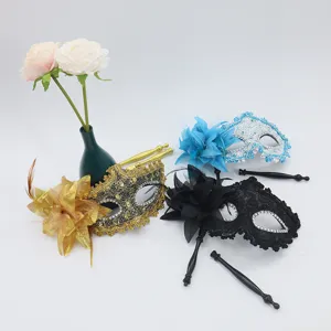 Handheld masquerade mask set with side flowers and rhinestones for party carnival events.