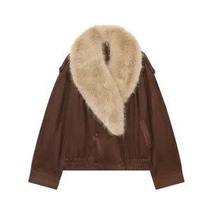 Detail view of women's brown suede jacket with cozy faux fur collar and elastic hem.