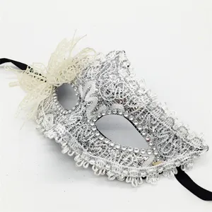 Silver lace masquerade mask detail view, glitter half face party eye mask with bow ribbon.