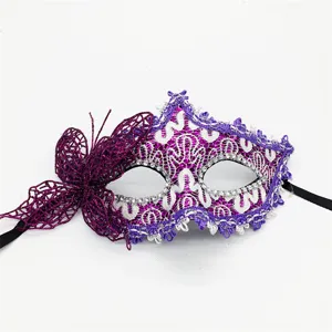 Purple lace masquerade eye mask detail view, elegant side butterfly and sparkling rhinestones.
