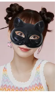 Detail view of a sleek black cat mask worn by a model, perfect for Halloween parties and cosplay.