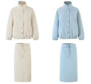 Detail shot of women casual jacket and skirt set, lapel collar, snap buttons, drawstring waist.