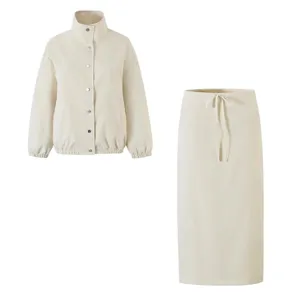 Chic faux leather jacket and midi skirt set, elegant casual outerwear outfit for women.