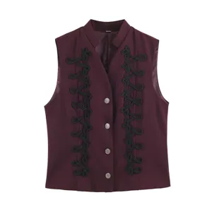 Burgundy sleeveless vest with black rope knot trim, front buttons, and stand collar style.