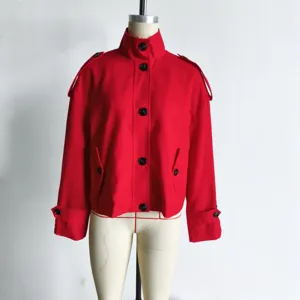 Red short trench coat detail, stand collar design with black buttons and stylish epaulets.