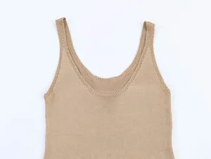 Knit tank top detail showing the fine knit texture, scoop neckline, and sleeveless cut.