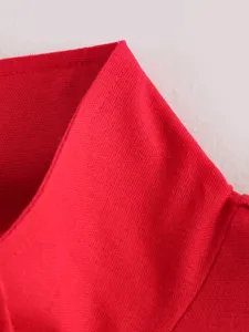 Red cotton linen coat collar detail fabric close-up fashion women outer apparel piece