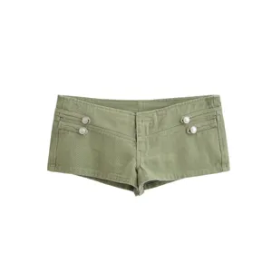 Olive green denim shorts detail, featuring decorative side straps and metallic buttons.