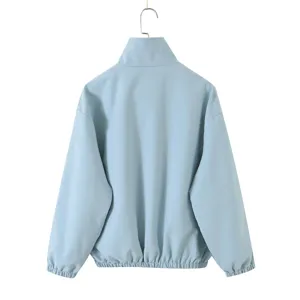 Back view detail of the light blue casual loose stand collar windbreaker jacket for women.