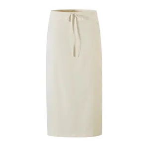 Beige midi skirt detail featuring a drawstring elastic waist and clean straight silhouette.