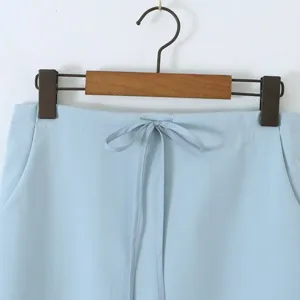 Light blue casual skirt detail with drawstring waist and pockets for women fashion style.
