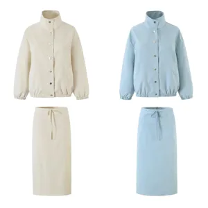 Women's fashion loose lapel trench coat and skirt set, elegant two-piece commuter outfit.