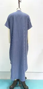 Blue and white vertical striped loose long dress detail, comfortable resort kaftan style.