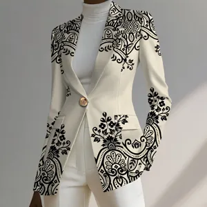 Detailed shot of an elegant women's printed blazer with floral pattern and golden button.