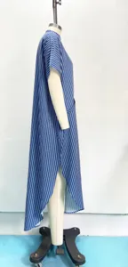 Blue and white striped dress side detail showing elegant split hem and comfortable batwing sleeves.