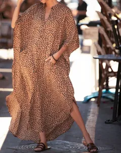Leopard print beach cover-up dress, batwing sleeve cardigan, stylish seaside vacation wear.