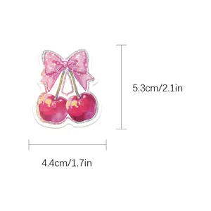 Autocollant holographique cerise avec nœud rose pour valise, journal et décoration.