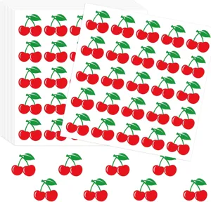 Gros plan detaille des autocollants mignons de cerises rouges avec feuilles pour loisirs.