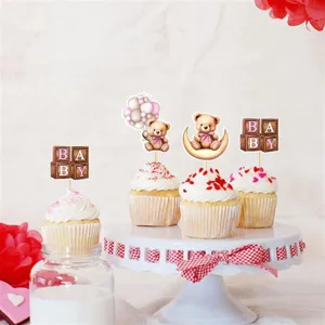 Jolies décorations de cupcakes en forme d'ours pour la fête d'anniversaire de bébé.