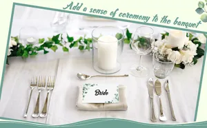 Detail view of a wedding table place card with eucalyptus design for banquet seating.