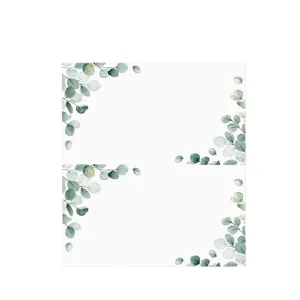 Blank folded place cards with watercolor eucalyptus leaves for wedding dinner party reception.