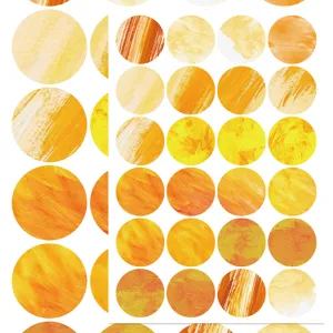 Close-up view of watercolor round dot stickers featuring artistic brush textures for DIY crafts.