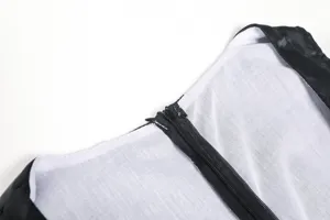 Close-up detail of the black zipper and white lining on the Halloween costume, neat stitching.