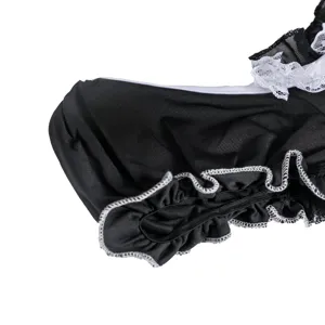 Detailed close-up shot of black and white maid cosplay lingerie with delicate ruffles.