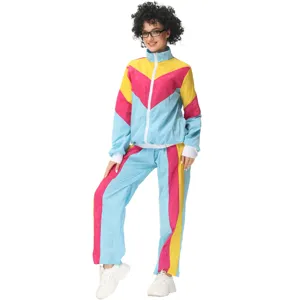 Retro 80s 90s colorful tracksuit costume detail showing the vibrant blue pink yellow design.