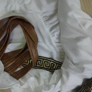 Greek warrior costume detail white robe brown belt Greek key pattern trim cosplay outfit