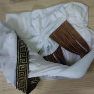 Greek warrior costume detail white fabric with gold meander pattern trim and brown straps