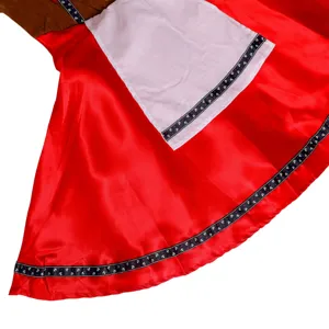 Detailed view of traditional Oktoberfest beer girl costume with red skirt and white apron.