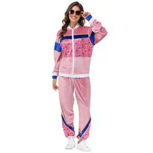 70s retro velour tracksuit featuring vibrant pink hue, blue stripes, and striking details.