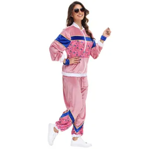 Retro 70s 80s pink velvet tracksuit for women, vintage colorblock party costume detail view.