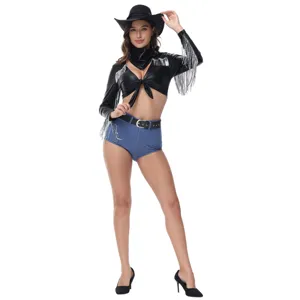 Detailed view of women's black fringe crop top and blue shorts for music festival.