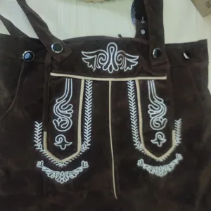 Men traditional German Oktoberfest lederhosen suspender shorts detailed brown embroidery.